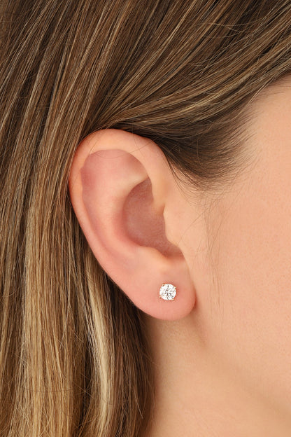 Single stone nailed silver earrings